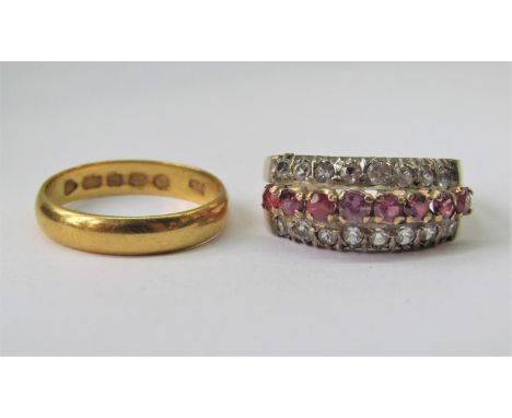 22ct wedding ring, size K, 2.5g and a 14k pink and white garnet dress ring, size M, 3.1g (2) 