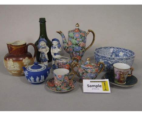 A collection of Japanese eggshell porcelain coffee wares with floral detail, comprising coffee pot, milk jug, covered sugar b