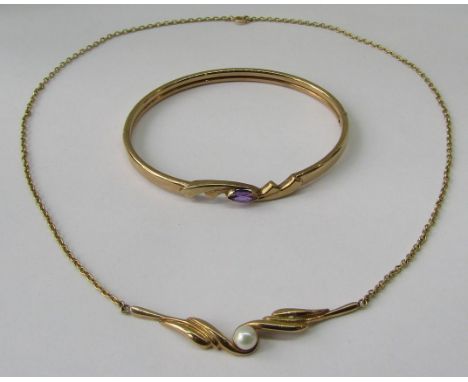 Stylised 9ct hinged bangle set with a marquise cut amethyst, together with a 9ct cultured pearl pendant necklace, 14.7g total