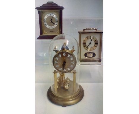 Two mantel clocks together with an anniversary clock. height of anniversary clock, height 27cm  
