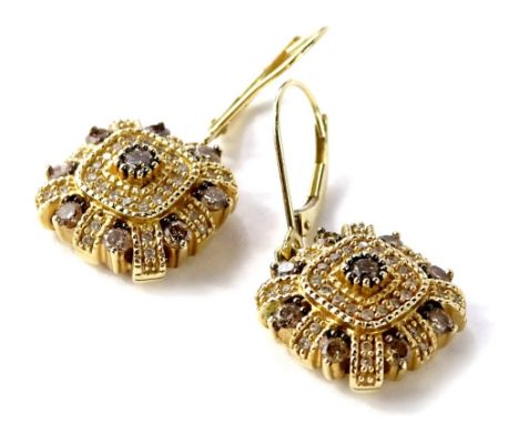 A pair of diamond cluster earrings, each with round brilliant cut central stone, approx 2.5mm diameter, with outer surround o