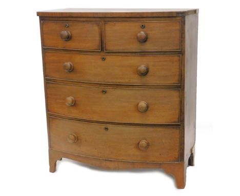 A Victorian mahogany bow front chest of drawers, the top with a plain veneered frieze, above two short and three long drawers