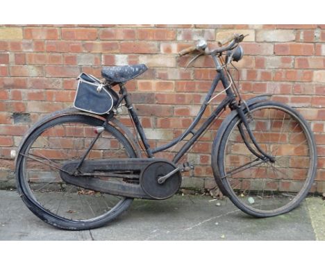 A Raleigh black painted vintage bicycle, with some chrome fittings. (AF)