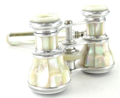 A pair of mother of pearl and chrome plated opera glasses, with side handles, stamped Belere Paris.