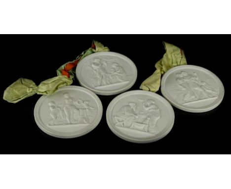 A set of four Royal Copenhagen porcelain bisque plaques, each of circular form and modelled with Nao classical figures, 14cm 