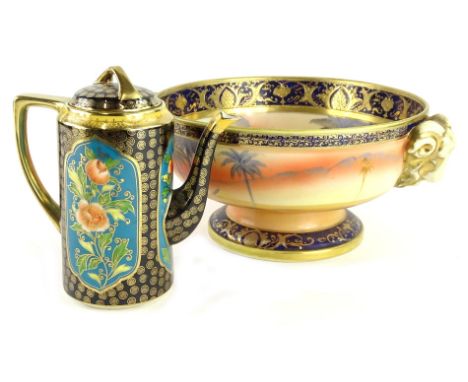 A Noritake porcelain fruit bowl or centre piece, with two gilt rams head masks, decorated overall with Arabic scenes, 28cm W,