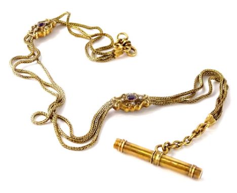 A watch chain, with amethyst and seed pearl motifs, and three strand sections, T-bar and clip, yellow metal, unmarked, 21.3g 