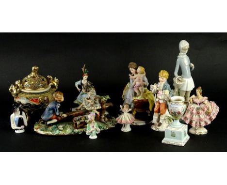 A collection of continental porcelain figures, to include Capodimonte, Lladro and a Japanese similar type Koro, some pieces (