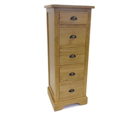 An ex shop display Hampton court oak chest of drawers, with six drawers in bracket feet, 47cm W.