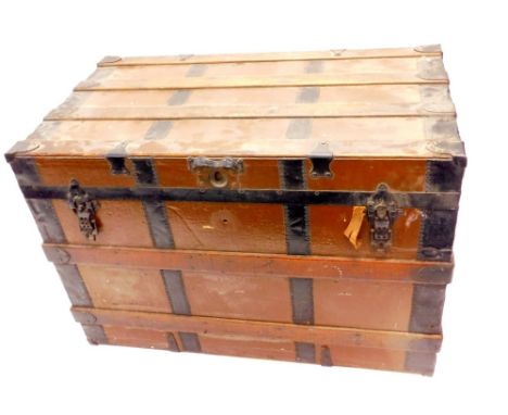A brown painted canvas and ebonised metal two handled cabin trunk, 87cm W.