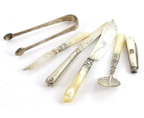 A collection of silver mounted items, etc., to include butter knife, fruit knife, folding fruit knife, some with mother of pe