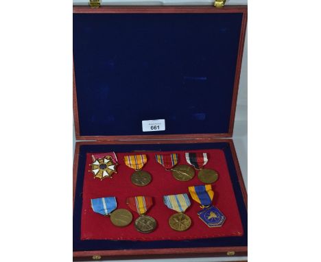 Cased American medals presented Col. Randolph inc. Legion of Merit, military commendation medal & national defence service me