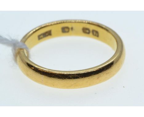 Yellow metal band ring, gold mark rubbed but tests for 22ct gold, size K, 4.04 grams, 