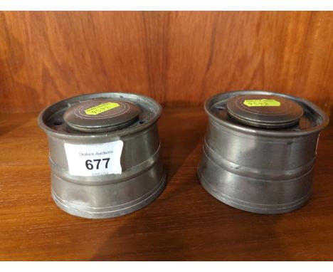Two C19th pewter ink wells with hinged lids and four pen holders, 8.5cm dia. 6.5cm heightSmall dents appropriate for age. Cer