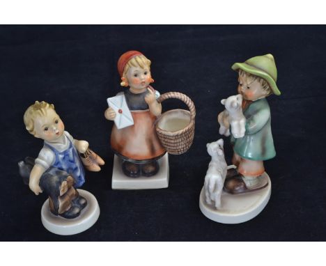 Three Goebel figures, height of tallest 14cm, inc. boot boy, shepherd boy and girl with basket 