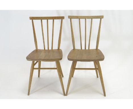 2x Ercol model 391 all purpose Windsor chairs. Natural finish, in beech and elm.Small split to one seat (approx 5cm) chairs o