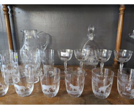 Collection of Queen Lace crystal glassware engraved with African wildlife; includes six tumblers, six high ball glasses, pitc