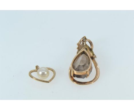 Two 14ct gold pendants, one set with a smokey quartz, the other heart-shaped with a cultured pearl, length 38mm & 20mm respec