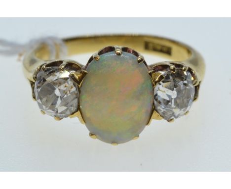 18ct gold, opal & diamond ring, the diamonds together weighing approximately 1.00 carat, size J1/2, 4.09 grams 