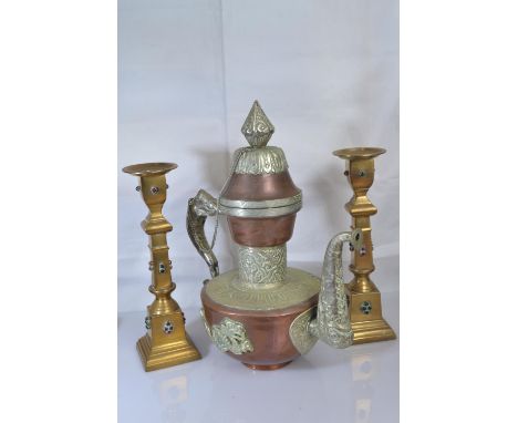 Oriental copper hot water pot with white metal dragon decoration, h28cm together with a pair of bejewelled brass candlesticks