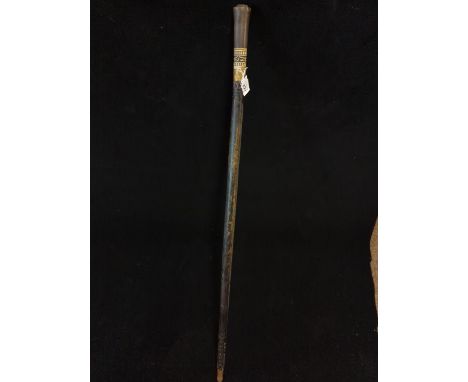 Antique sword stick with carved handle 