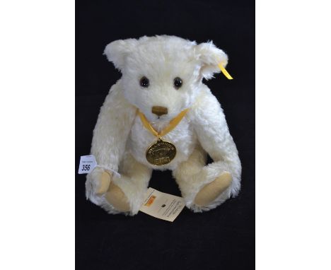 Steiff for Danbury Mint 'The Millennium Bear', white blonde mohair with medallion on ribbon, fully jointed, Steiff button and