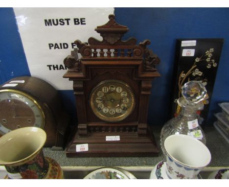 AMERICAN WALNUT HEAVILY CARVED MANTEL CLOCK WITH BRASS DIAL  