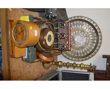 A box containing a model cottage; clock parts; brass candle stick; three hole mantel clock etc