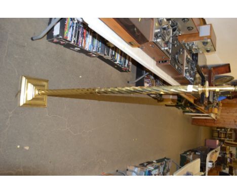 A brass standard lamp, sold as collectors item