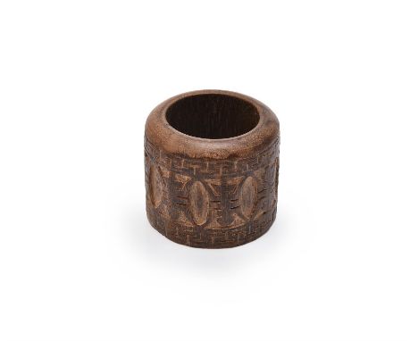 A Chinese aloeswood archer's ring, carved with a band of shou characters, 3.4cm diameter x 3cm high, weight 19 grams, with fi
