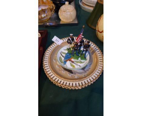 Pair of brown ground Lakin ribbon plates, 2 hand painted bird trinket dishes and 4 USA bandsmen figures.