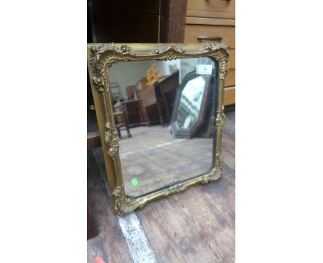 Gilt framed wall mirror