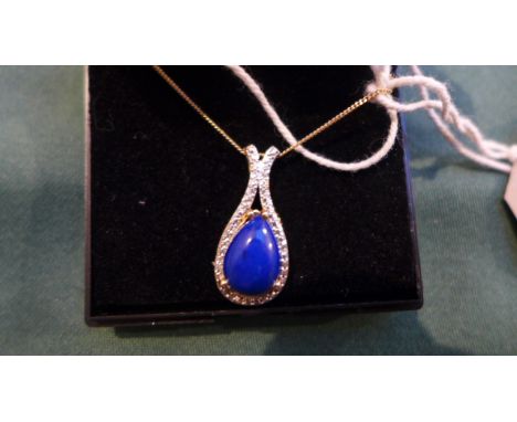 Lapis Lazuli and 2 diamond set pendant with chain