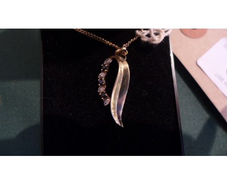 Sapphire and diamond pendant with chain