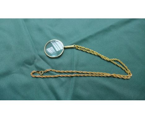 Ladies gilt eye glass and chain