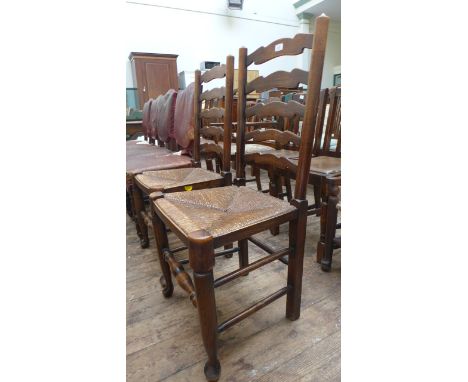 Pair of oak high ladder backed hall chairs the seats of each upholstered in ropework finish
