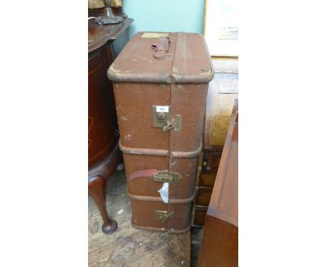Brown canvas travelling trunk