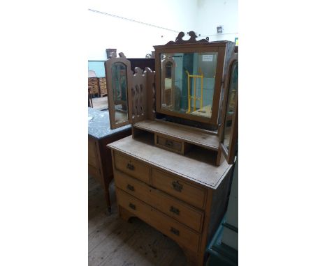 Pine dressing table fitted central framed and bevel edged side mirrors, trinket drawer,  2 short and 3 long drawers all with 