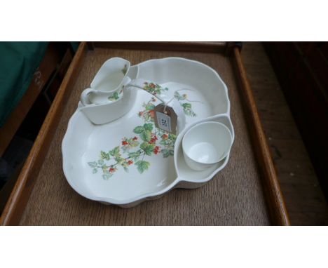 Oval shaped white ground china strawberry dish inset sugar basin and cream jug