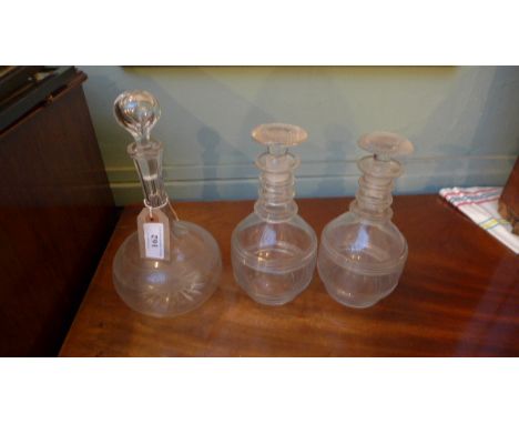 Port decanter and a pair of antique cut glass spirit decanters