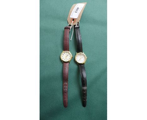 2 ladies Timex Indiglo wrist watches both with leather straps