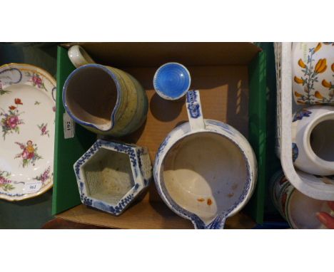 Magpie lot including blue and white milk jug, patterned stoneware jug, blue and white plant holder and glass pin holder with 