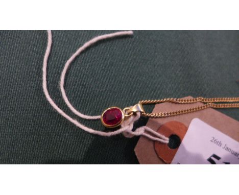 18 ct. gold chain necklace, the pendant with oval cut ruby stone (8 1/2 grams)