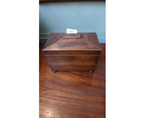 Georgian walnut caddy box decorated lion mask handles all on four bun feet