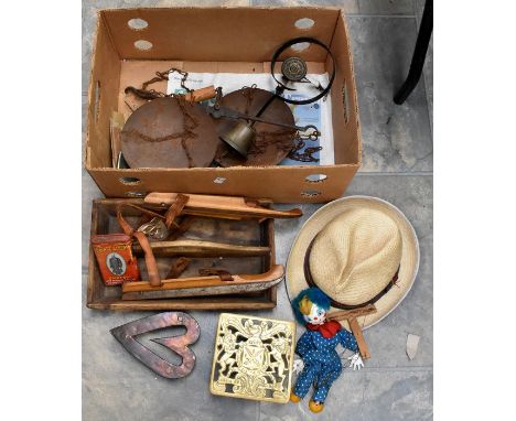 Collection of metal wares including Georgian trivets, hanging scales, servants bell, vintage ice skates, Pelham puppet, vinta