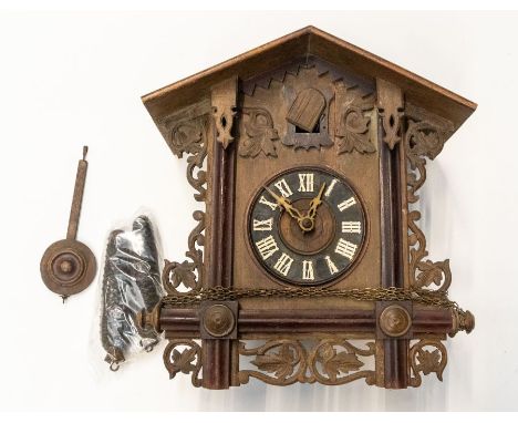 Black Forest cuckoo clock, 5" dial, movement stamped GLS and a leaf, x 2 weights, and pendulum present