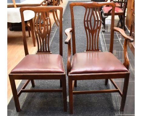 A matched set of six Chippendale style mahogany dining chairs, early to mid 20th Century, with shaped and pierced back splats
