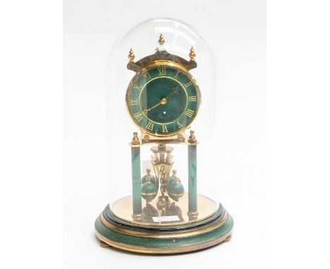 A German Torsion or 400 day clock, in original box made by Kieninger and Obergfell, Germany, original dome x 2 keys, 3" dial 