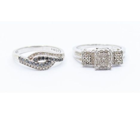 Two 9ct white gold and diamond dress rings, comprising a three tier rectangular/square cluster ring, size O, along with a twi