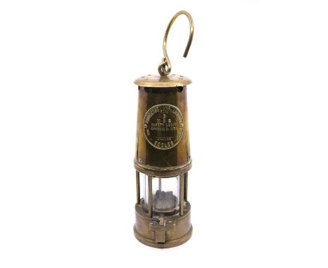 An Eccles brass miner's lamp, The Protector Lamp & Lighting Co Ltd, Type 6, No.B/28, c.1890In good polished condition 